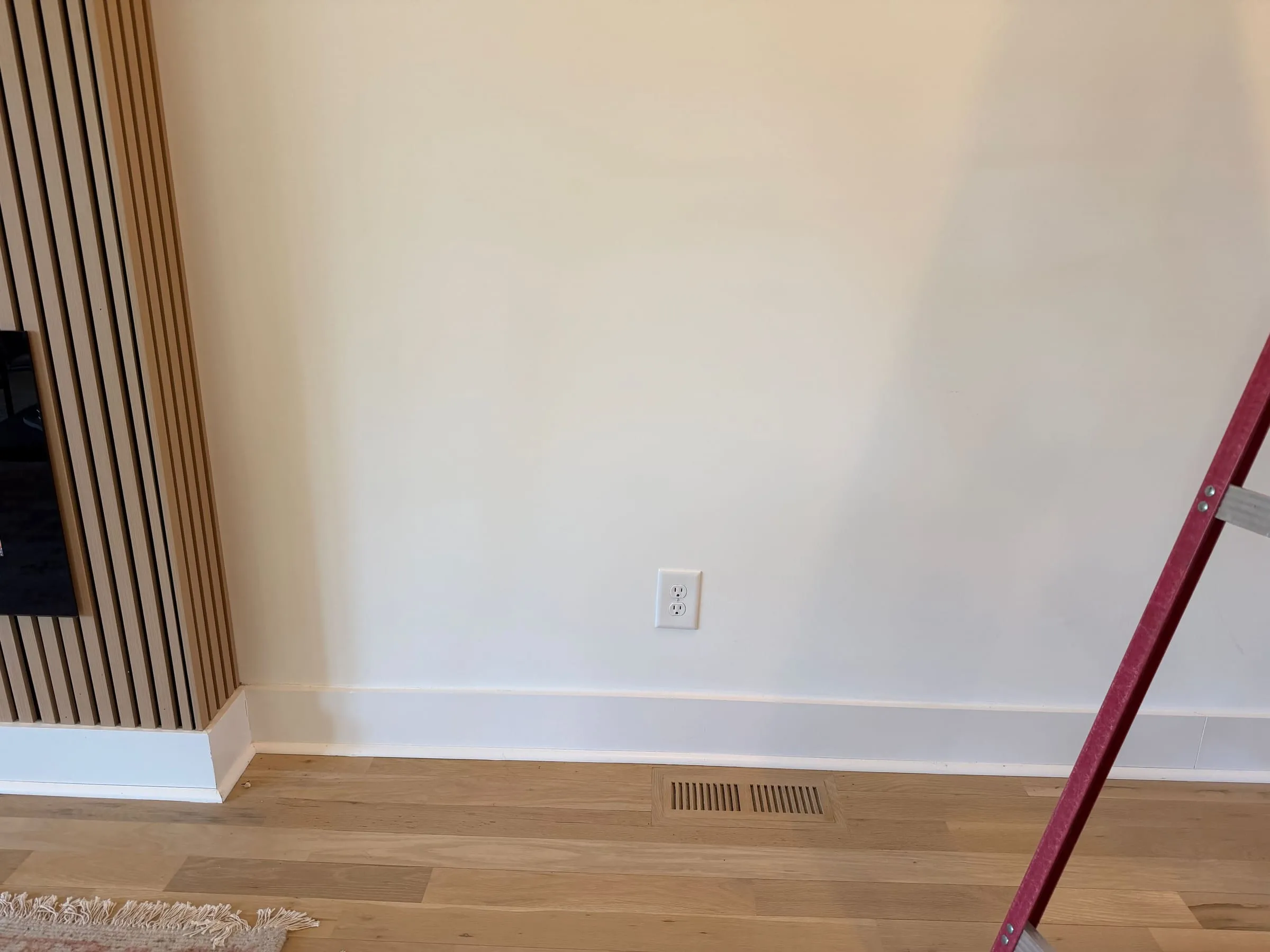 Cabinet base construction over floor register